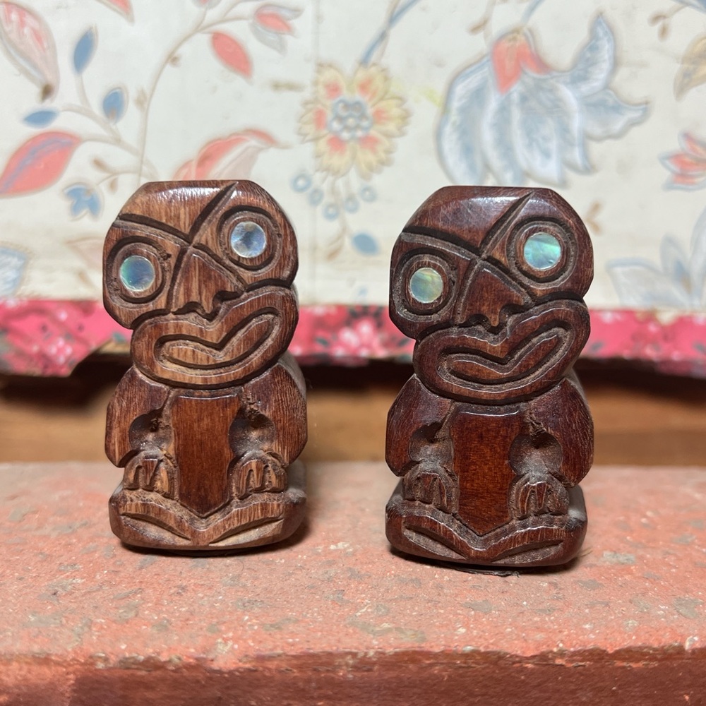Vintage pair of Maori Hei-Tiki salt and pepper shakers with Paua shells